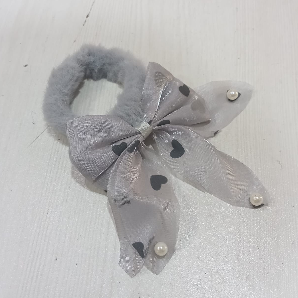 AM5621 Pearl Bow Hair Ring for Women (Multicolour)