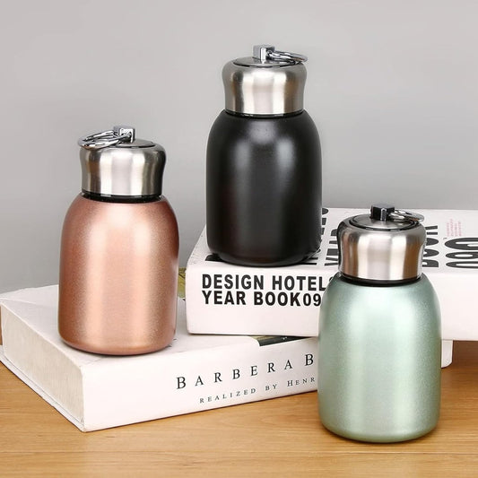 AM7802 COMPACT STAINLESS STEEL MINI BOTTLE WITH CARRYING RING FOR CONVENIENT ON THE GO HYDRATION