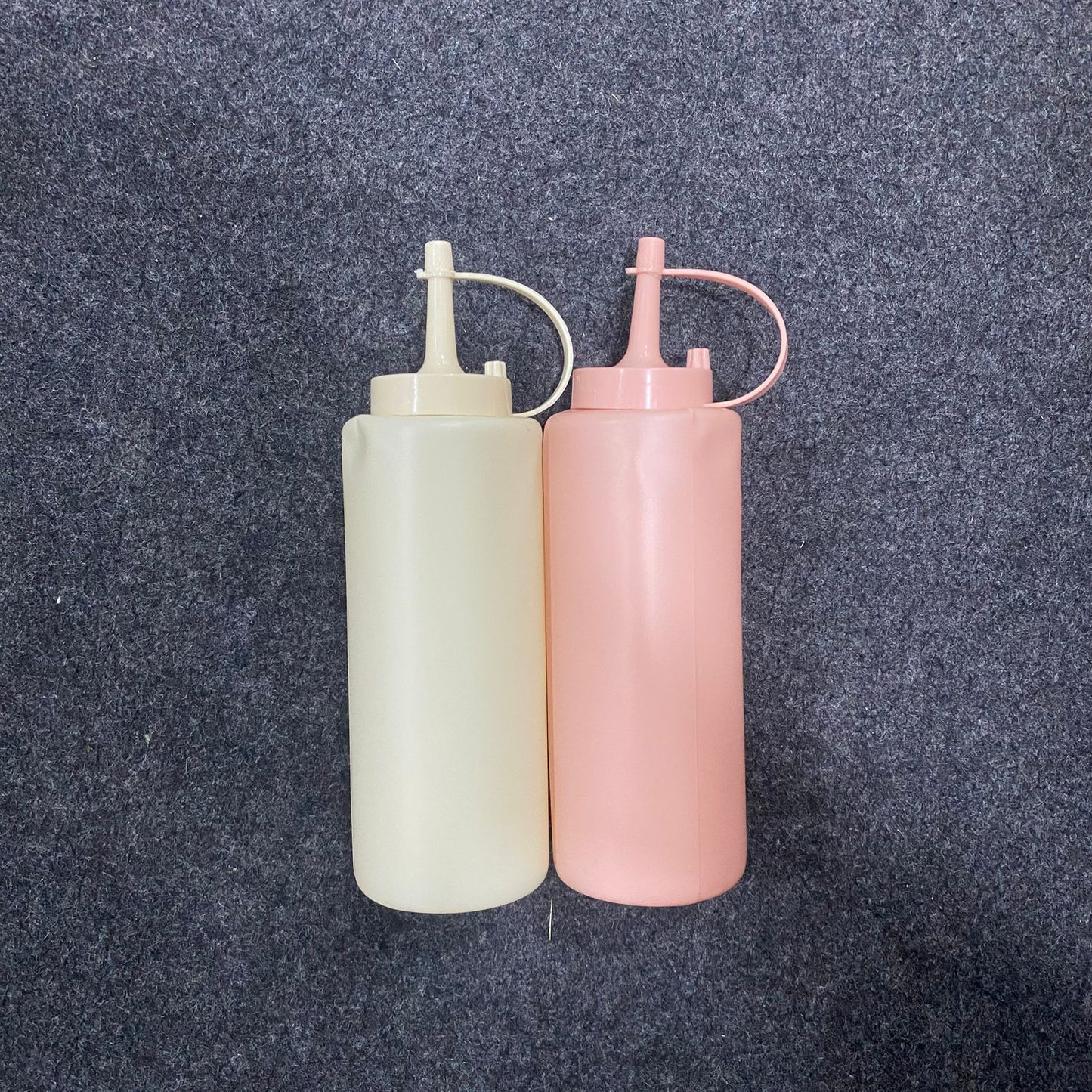 AM7667 Set of Two Pastel Colored Plastic Squeeze Condiment Bottles with Nozzle Caps for Kitchen Use