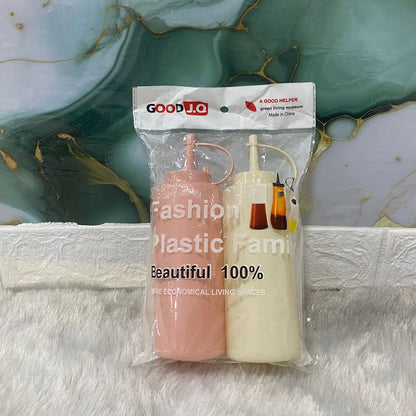AM7667 Set of Two Pastel Colored Plastic Squeeze Condiment Bottles with Nozzle Caps for Kitchen Use
