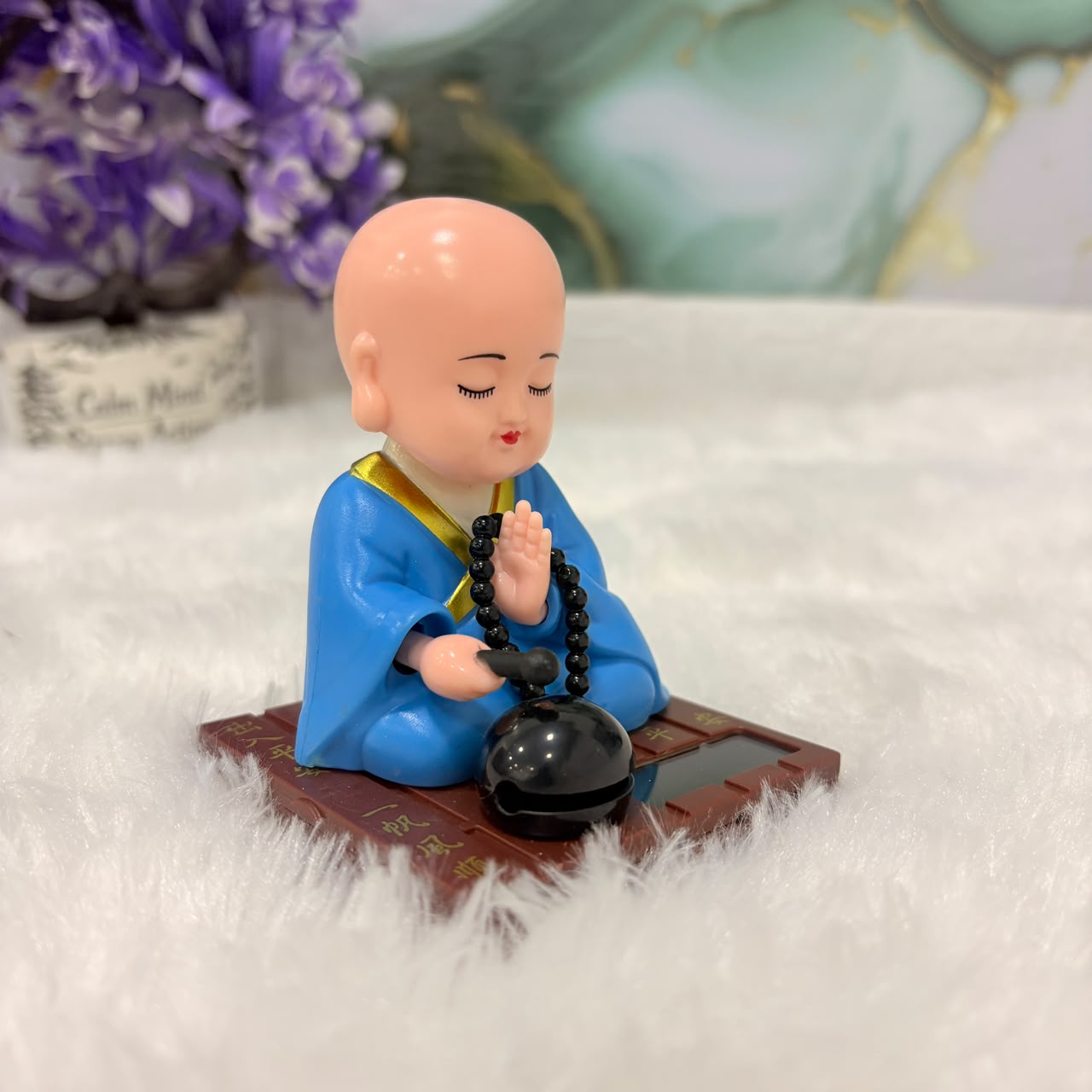 TM0194 Solar-Powered Moving Head Buddha Statue