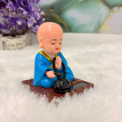 TM0194 Solar-Powered Moving Head Buddha Statue