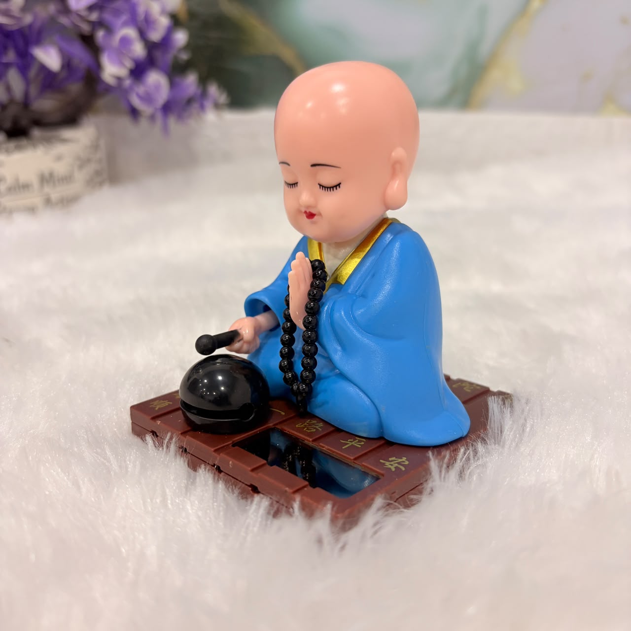 TM0194 Solar-Powered Moving Head Buddha Statue